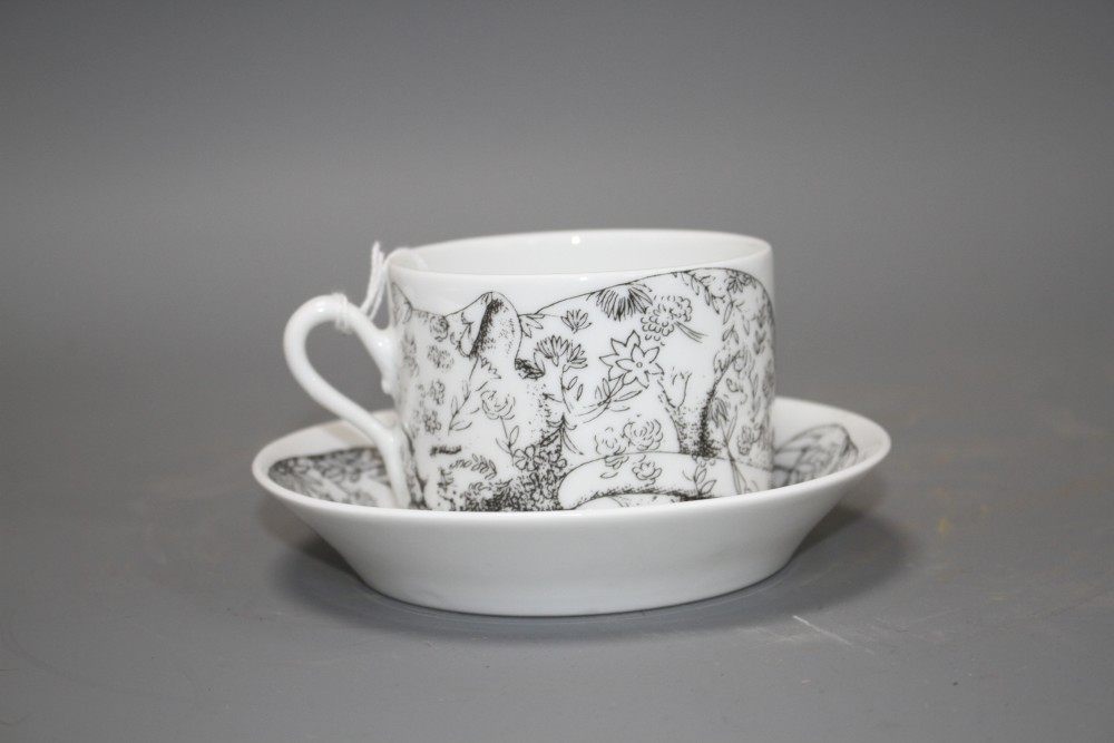 A Fornasetti Ginori High Fidelity cup and saucer, decorated with cats, saucer 13.5cm, cup height 5,75cm